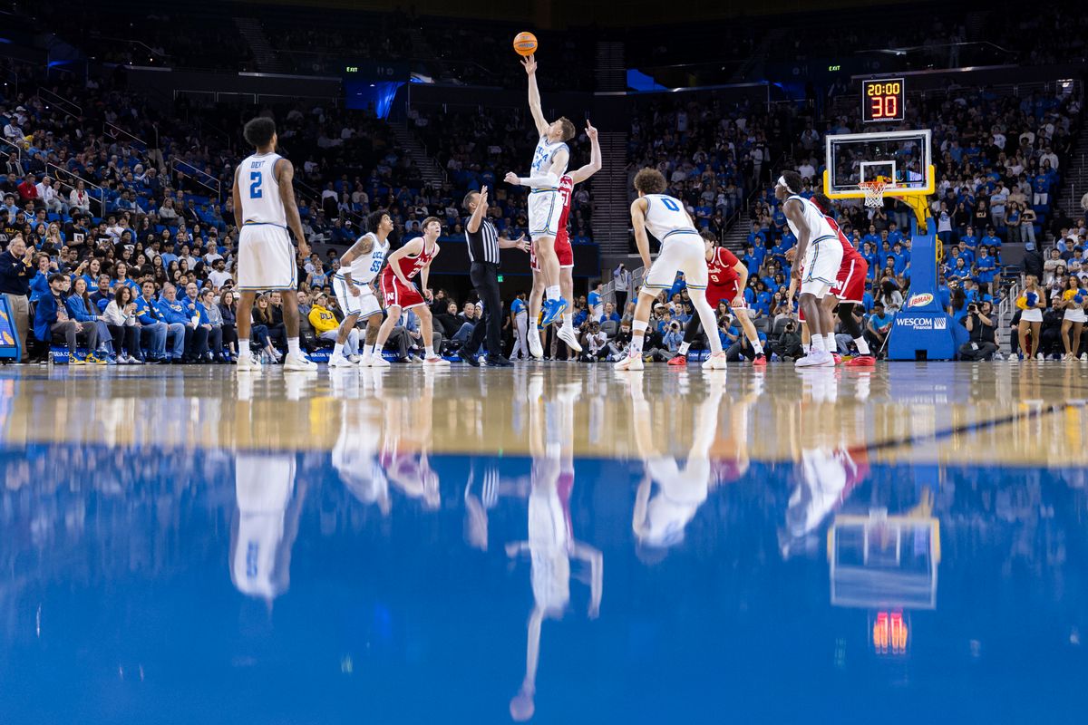 Tyler Bilodeau #34 of the UCLA Bruins and Rienk Mast #51 of the Nebraska Cornhuskers jump for the opening tip-off during an NCAA basketball game, Tuesday March 3, 2026 in Los Angeles, Calif. Tyler Bilodeau #34 of the UCLA Bruins and Rienk Mast #51 of the Nebraska Cornhuskers jump for the opening tip-off during an NCAA basketball game, Tuesday March 3, 2026 in Los Angeles, Calif.