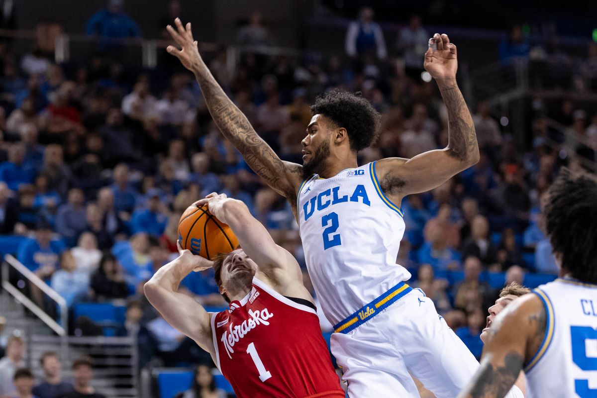 Donovan Dent #2 of the UCLA Bruins jumps to block the shot by Sam Hoiberg #1 of the Nebraska Cornhuskers during an NCAA basketball game, Tuesday March 3, 2026 in Los Angeles, Calif. Donovan Dent #2 of the UCLA Bruins jumps to block the shot by Sam Hoiberg #1 of the Nebraska Cornhuskers during an NCAA basketball game, Tuesday March 3, 2026 in Los Angeles, Calif.