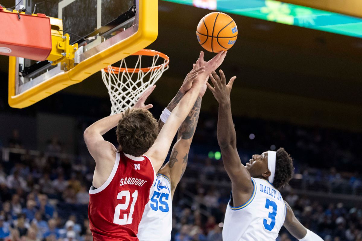 Pryce Sandfort #21 of the Nebraska Cornhuskers lays the ball up against Eric Dailey Jr. #3 of the UCLA Bruins during an NCAA basketball game, Tuesday March 3, 2026 in Los Angeles, Calif. Pryce Sandfort #21 of the Nebraska Cornhuskers lays the ball up against Eric Dailey Jr. #3 of the UCLA Bruins during an NCAA basketball game, Tuesday March 3, 2026 in Los Angeles, Calif.