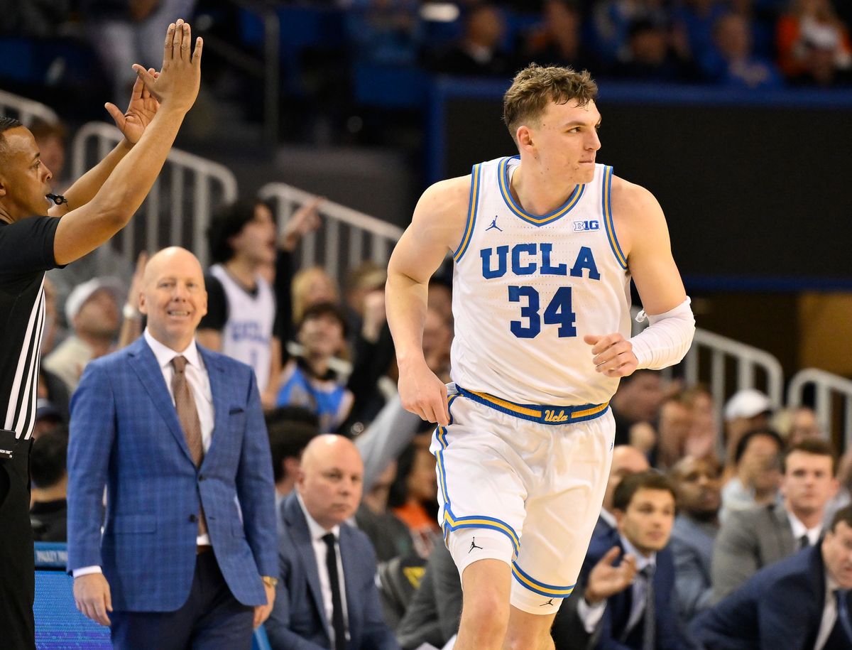 UCLA forward Tyler Bilodeau (34) runs back on defense after scoring a three-point basket during the second half against the Illinois Fighting Illini at Pauley Pavilion presented by Wescom Financial. UCLA forward Tyler Bilodeau (34) runs back on defense after scoring a three-point basket during the second half against the Illinois Fighting Illini at Pauley Pavilion presented by Wescom Financial.