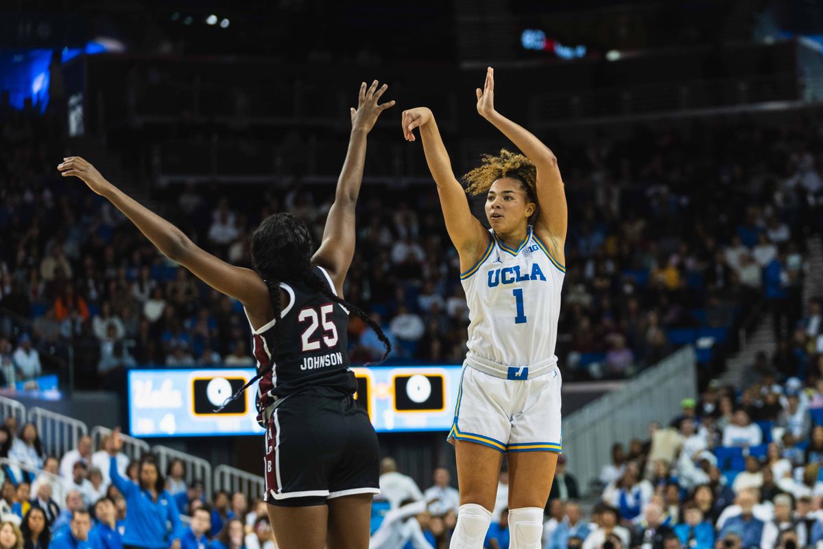UCLA guard Kiki Rice (1) taking a quick jumper during an NCAA basketball game against the South Carolina Gamecocks, Sunday November 24th, 2024 in Los Angeles, California. 