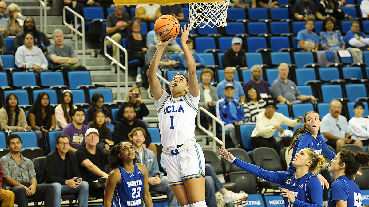 UCLA Bruins guard Kiki Rice (1) lays in a basket during an NCAA basketball game against the UCSB Gauchos on Thursday, November 6, 2025 at Pauley Pavilion in Los Angeles, Calif. Bruins defeated the Gauchos 87-50. UCLA Bruins guard Kiki Rice (1) lays in a basket during an NCAA basketball game against the UCSB Gauchos on Thursday, November 6, 2025 at Pauley Pavilion in Los Angeles, Calif. Bruins defeated the Gauchos 87-50.