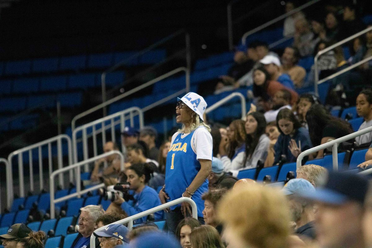 A UCLA fan cheers from the crowd during a NCAA basketball game between UCLA and Southern University on Sunday, November 23, 2025 at Pauley Pavilion in Los Angeles, CA. A UCLA fan cheers from the crowd during a NCAA basketball game between UCLA and Southern University on Sunday, November 23, 2025 at Pauley Pavilion in Los Angeles, CA.