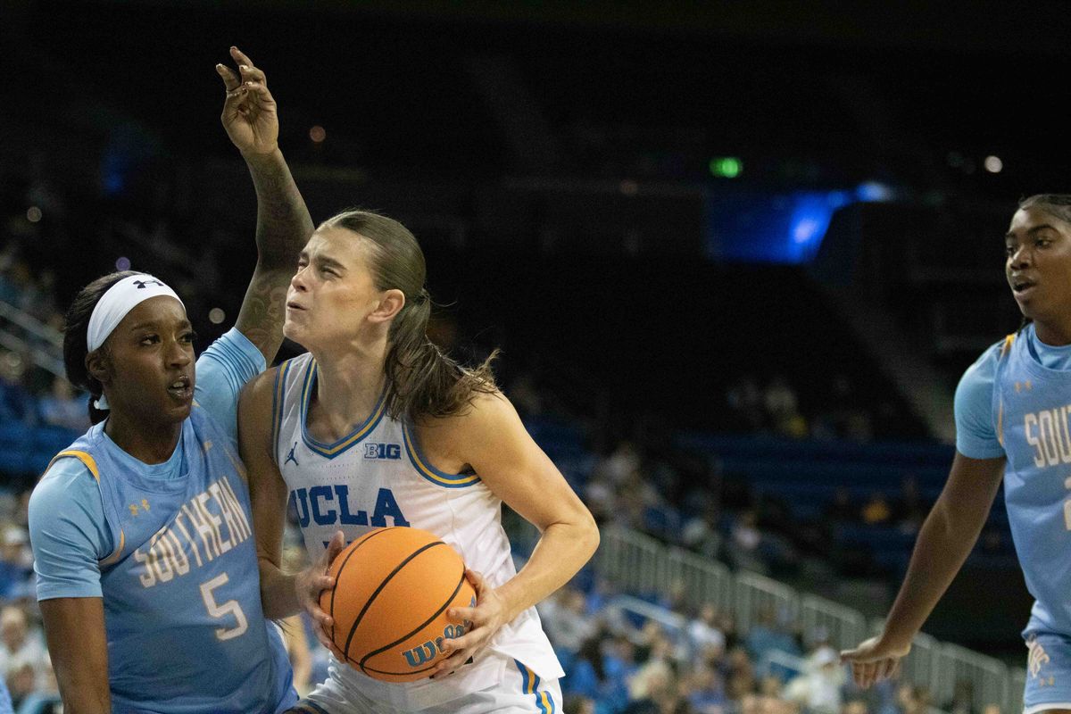 UCLA guard Gabriela Jaquez (11) drives to the basket while defended by Southern guard D'Shauntae Edwards (5) during a NCAA basketball game between UCLA and Southern University on Sunday, November 23, 2025 at Pauley Pavilion in Los Angeles, CA. UCLA guard Gabriela Jaquez (11) drives to the basket while defended by Southern guard D'Shauntae Edwards (5) during a NCAA basketball game between UCLA and Southern University on Sunday, November 23, 2025 at Pauley Pavilion in Los Angeles, CA.