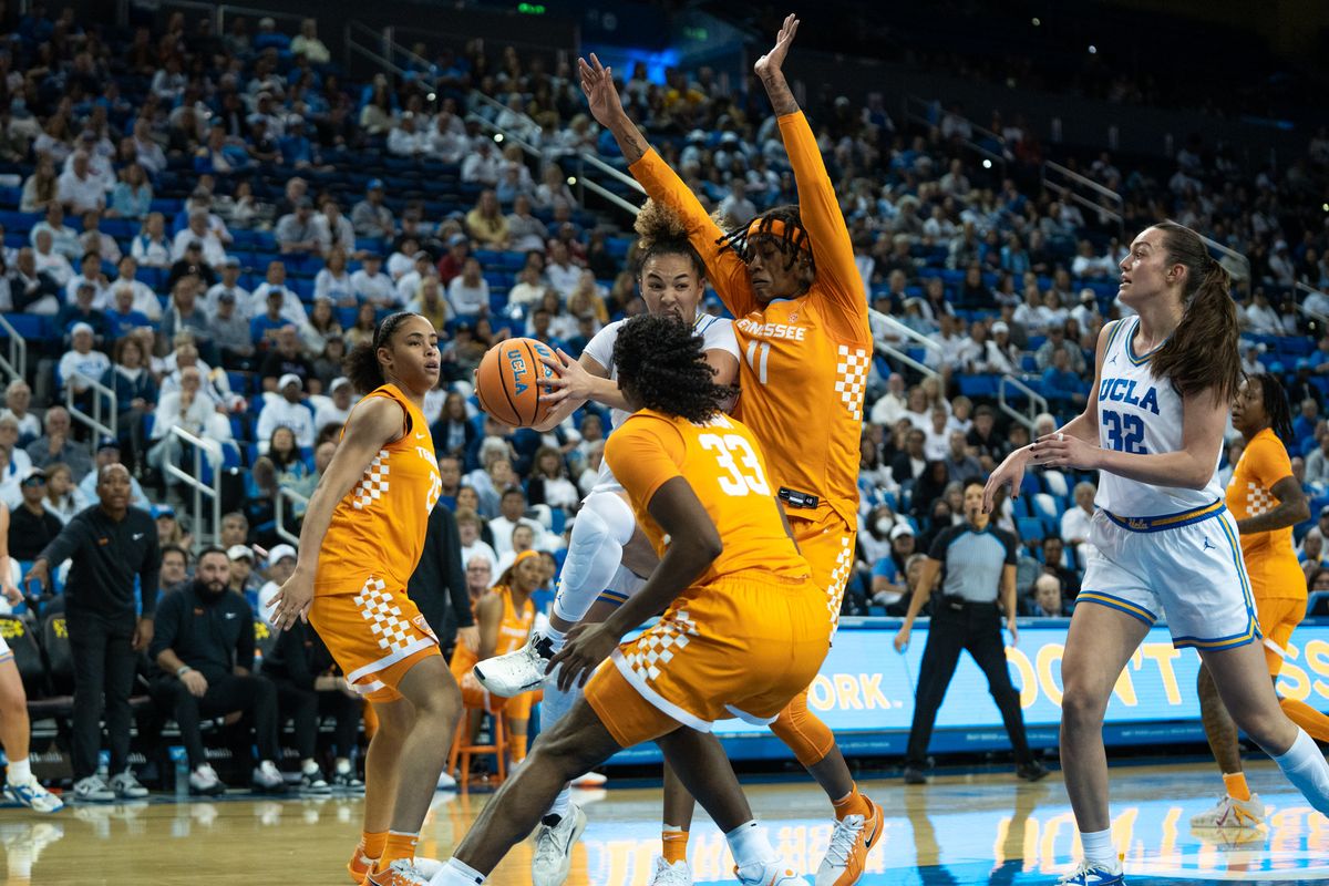 UCLA Bruins guard KiKi Rice (1) drives on three defenders and kicks it out to the shooter during an NCAA basketball game against the Tennessee Lady Volunteers on Sunday, November 30, 2025 at Pauley Pavilion in Los Angeles, Calif. UCLA Bruins guard KiKi Rice (1) drives on three defenders and kicks it out to the shooter during an NCAA basketball game against the Tennessee Lady Volunteers on Sunday, November 30, 2025 at Pauley Pavilion in Los Angeles, Calif.