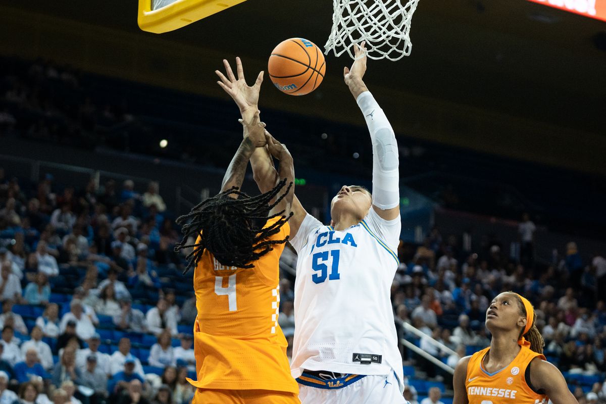 UCLA Bruins center Lauren Betts (51) goes up on the defender and gets slapped in the arm during an NCAA basketball game against the Tennessee Lady Volunteers on Sunday, November 30, 2025 at Pauley Pavilion in Los Angeles, Calif. UCLA Bruins center Lauren Betts (51) goes up on the defender and gets slapped in the arm during an NCAA basketball game against the Tennessee Lady Volunteers on Sunday, November 30, 2025 at Pauley Pavilion in Los Angeles, Calif.