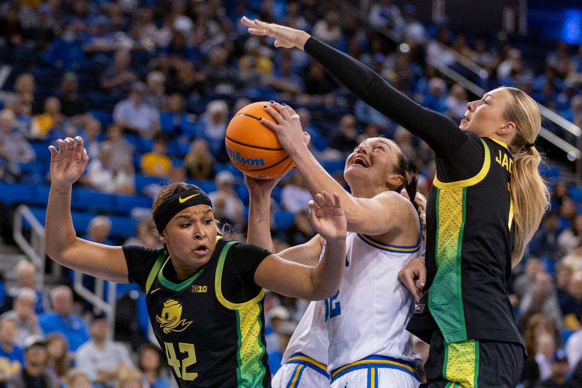 Forward Angela Dugalić #32 of the UCLA Bruins drives through traffic during an NCAA basketball game against the Oregon Ducks, Sunday December 7, 2025 in Los Angeles, Calif. Forward Angela Dugalić #32 of the UCLA Bruins drives through traffic during an NCAA basketball game against the Oregon Ducks, Sunday December 7, 2025 in Los Angeles, Calif.