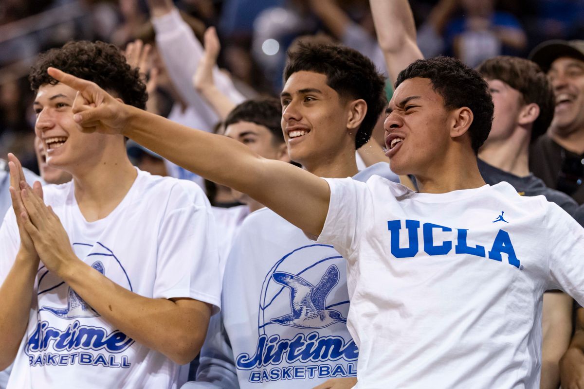 A UCLA fan celebrates in the stands during an NCAA basketball game between the Oregon Ducks and UCLA Bruins, Sunday December 7, 2025 in Los Angeles, Calif. A UCLA fan celebrates in the stands during an NCAA basketball game between the Oregon Ducks and UCLA Bruins, Sunday December 7, 2025 in Los Angeles, Calif.