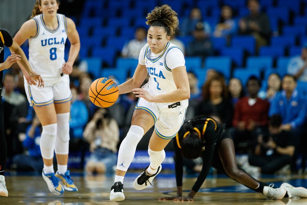 UCLA Bruins guard Kiki Rice (1) dribbles the ball up the court during an NCAA basketball game against Long Beach State, Saturday December 20, 2025 in Los Angeles, Calif. UCLA Bruins guard Kiki Rice (1) dribbles the ball up the court during an NCAA basketball game against Long Beach State, Saturday December 20, 2025 in Los Angeles, Calif.