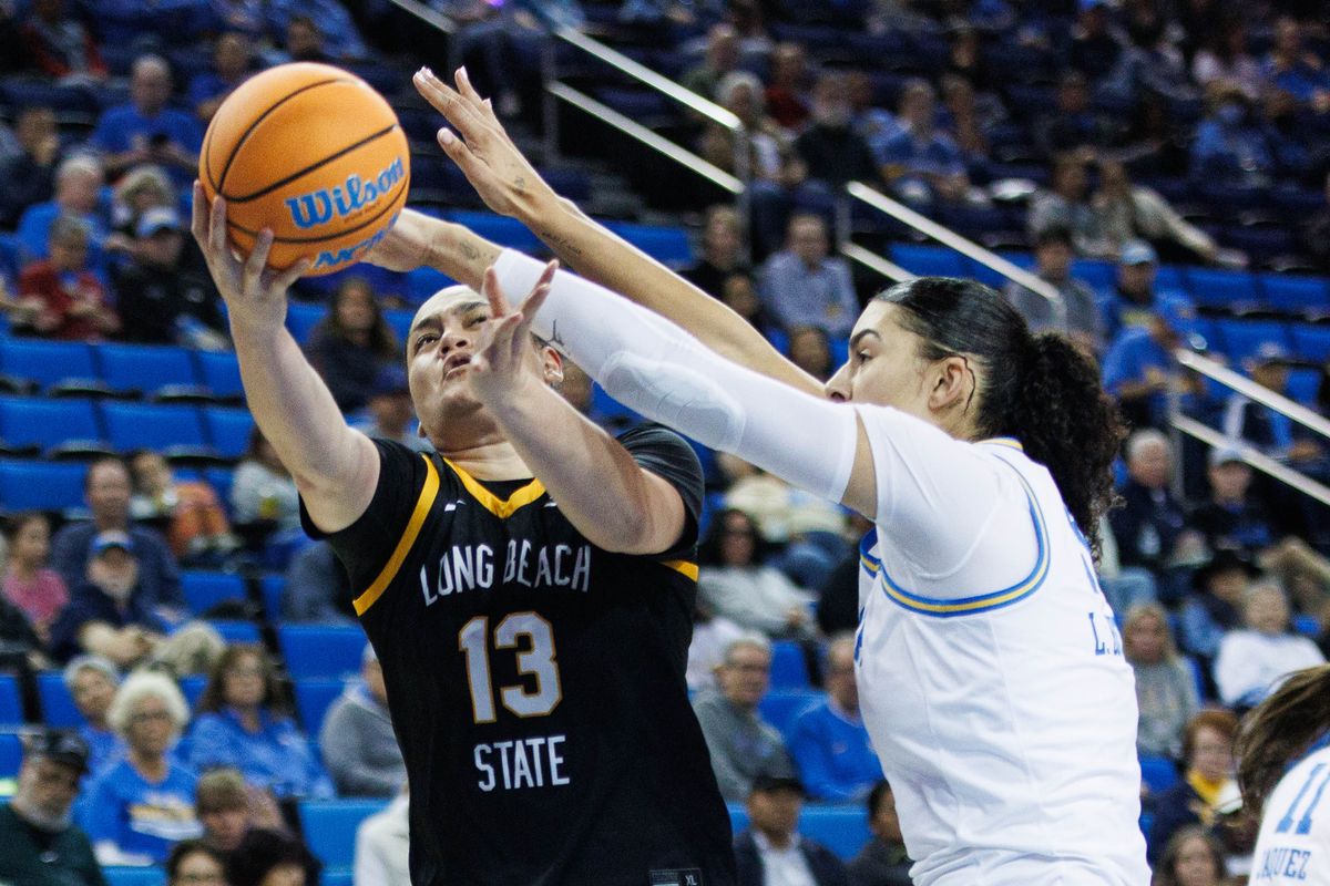 Long Beach State guard Khylee Pepe (13) attempts a layup during an NCAA basketball game against the UCLA Bruins, Saturday December 20, 2025 in Los Angeles, Calif. Long Beach State guard Khylee Pepe (13) attempts a layup during an NCAA basketball game against the UCLA Bruins, Saturday December 20, 2025 in Los Angeles, Calif.
