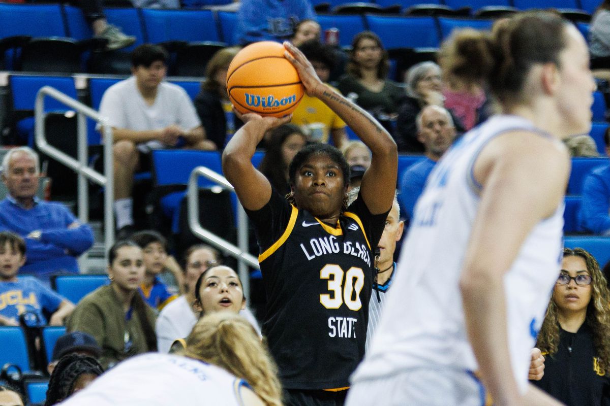 Long Beach State guard JaQuoia Jones-Brown (30) takes a shot during an NCAA basketball game against the UCLA Bruins, Saturday December 20, 2025 in Los Angeles, Calif. Long Beach State guard JaQuoia Jones-Brown (30) takes a shot during an NCAA basketball game against the UCLA Bruins, Saturday December 20, 2025 in Los Angeles, Calif.