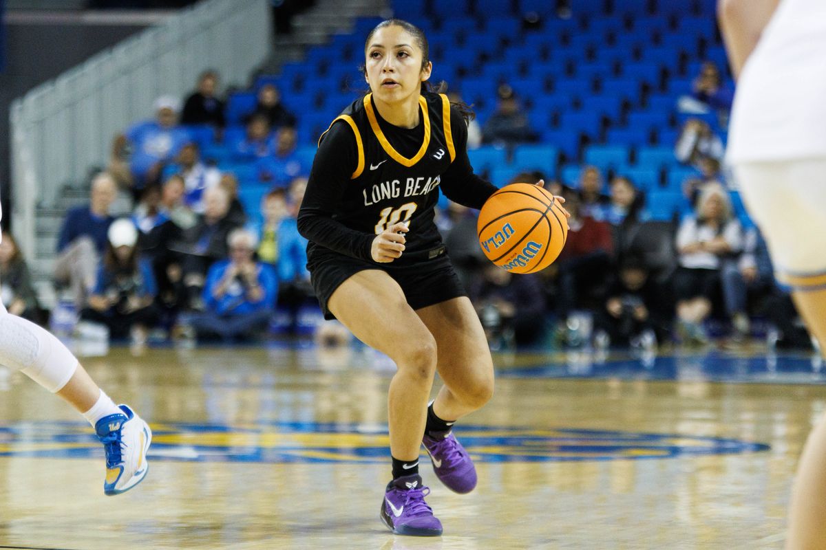Long Beach State guard Christy Reynoso (10) dribbles up with the ball during an NCAA basketball game against the UCLA Bruins, Saturday December 20, 2025 in Los Angeles, Calif. Long Beach State guard Christy Reynoso (10) dribbles up with the ball during an NCAA basketball game against the UCLA Bruins, Saturday December 20, 2025 in Los Angeles, Calif.