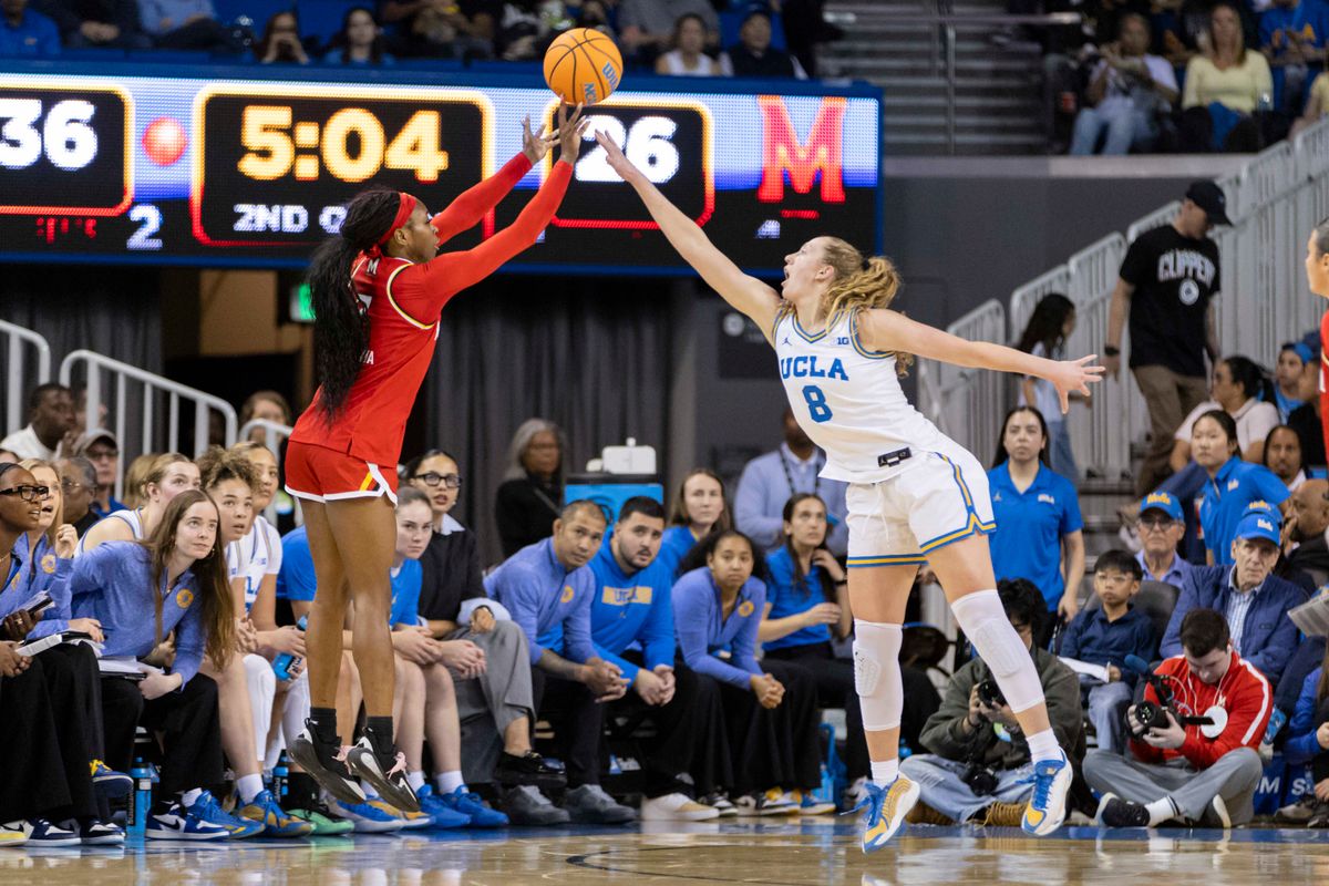 Oluchi Okananwa #7 of the Maryland Terrapins shoots the ball over Gianna Kneepkens #8 of the UCLA Bruins during an NCAA basketball game, Sunday January 18, 2026 in Los Angeles, Calif. Oluchi Okananwa #7 of the Maryland Terrapins shoots the ball over Gianna Kneepkens #8 of the UCLA Bruins during an NCAA basketball game, Sunday January 18, 2026 in Los Angeles, Calif.