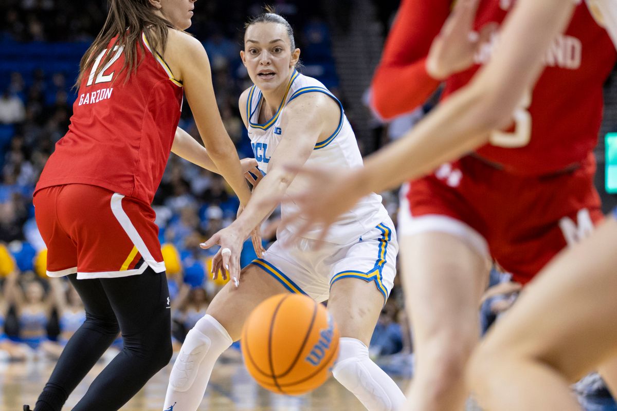 Angela Dugalić #32 of the UCLA Bruins passes through traffic during an NCAA basketball game against the Maryland Terrapins, Sunday January 18, 2026 in Los Angeles, Calif. Angela Dugalić #32 of the UCLA Bruins passes through traffic during an NCAA basketball game against the Maryland Terrapins, Sunday January 18, 2026 in Los Angeles, Calif.