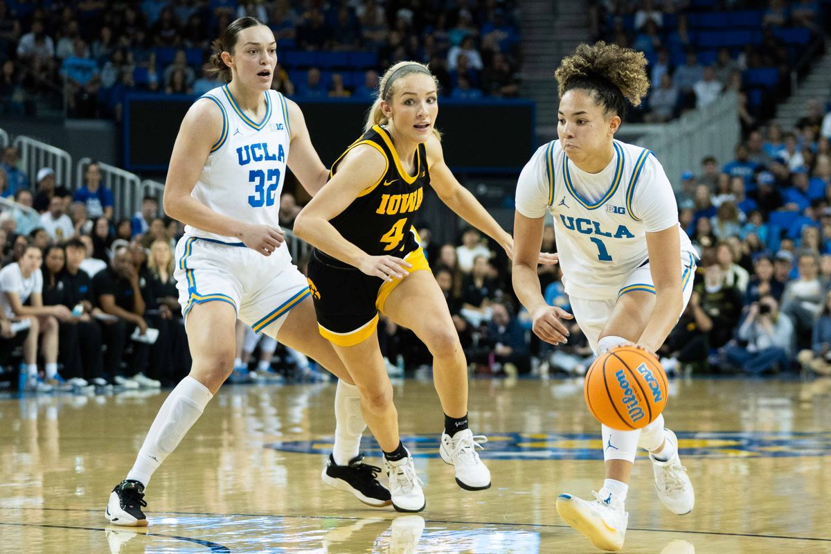 UCLA guard Kiki Rice (1) looking for the open teammate during a Big 10 basketball game against Iowa, Sunday February 1st, 2026 in Los Angeles, California UCLA guard Kiki Rice (1) looking for the open teammate during a Big 10 basketball game against Iowa, Sunday February 1st, 2026 in Los Angeles, California