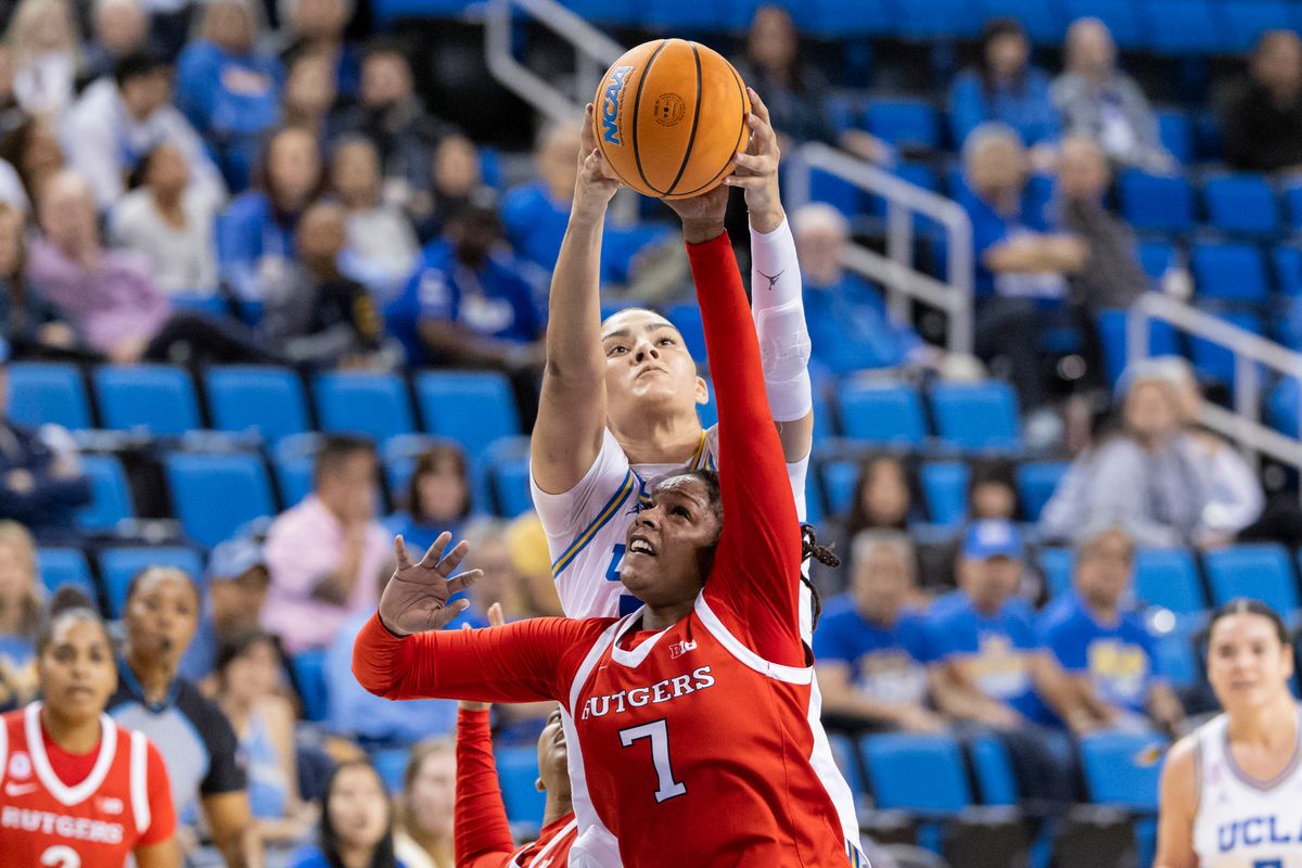 Precious Gem Wheeler #7 of the Rutgers Scarlet Knights and Lauren Betts #51 of the UCLA Bruins reach for the ball during an NCAA basketball game, Wednesday February 4, 2026 in Los Angeles, Calif. Precious Gem Wheeler #7 of the Rutgers Scarlet Knights and Lauren Betts #51 of the UCLA Bruins reach for the ball during an NCAA basketball game, Wednesday February 4, 2026 in Los Angeles, Calif.