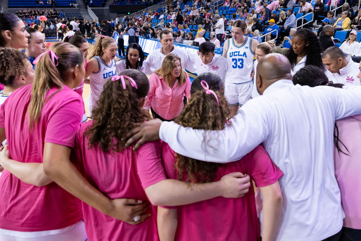 The UCLA Bruins huddle up as head coach Cori Close of the UCLA Bruins gives a pregame speech before an NCAA basketball game against the Indiana Hoosiers, February 15, 2026 in Los Angeles, Calif.