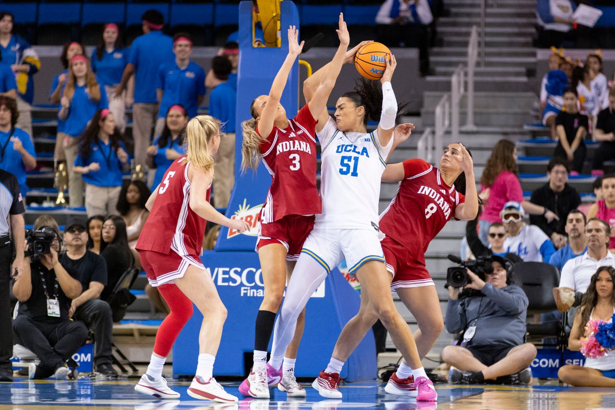 Lauren Betts #51 of the UCLA Bruins handles the ball in the post during an NCAA basketball game against the Indiana Hoosiers, February 15, 2026 in Los Angeles, Calif.