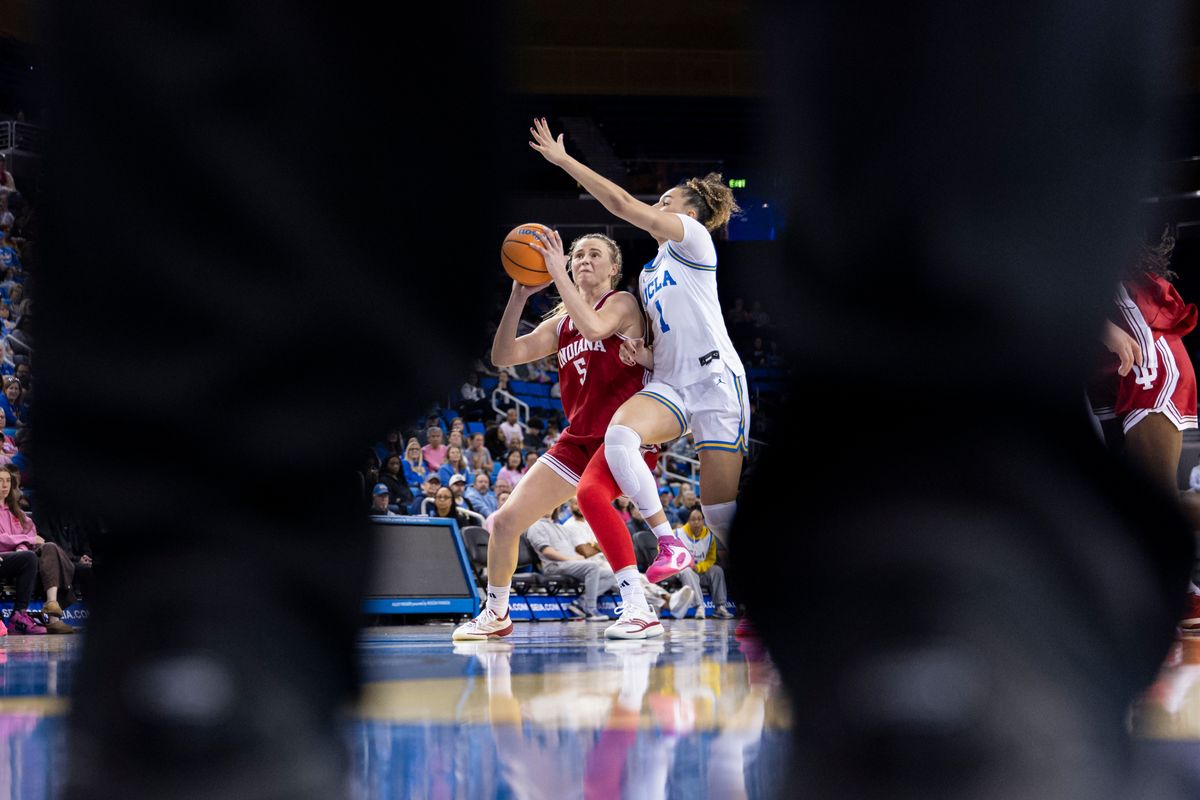Lenée Beaumont #5 of the Indiana Hoosiers holds the ball during an NCAA basketball game against the UCLA Bruins, February 15, 2026 in Los Angeles, Calif.