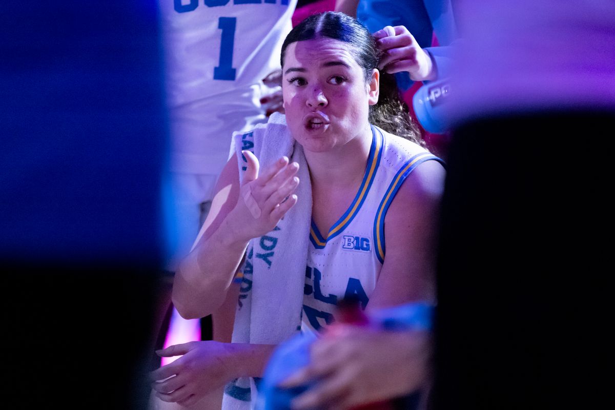 Charlisse Leger-Walker #5 of the UCLA Bruins talks to her team in the huddle during an NCAA basketball game against the Indiana Hoosiers, February 15, 2026 in Los Angeles, Calif.