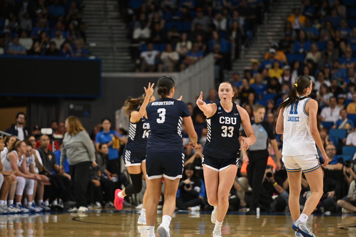 CBU forward Amanda Muse #33 celebrates after team mate Shawnessy Nordstrom #3 made a three point shot during an NCAA Women's Basketball game between California Baptist University and University of California Los Angeles on Saturday, March 21, 2026 at Pauley Pavilion in Los Angeles Calif CBU forward Amanda Muse #33 celebrates after team mate Shawnessy Nordstrom #3 made a three point shot during an NCAA Women's Basketball game between California Baptist University and University of California Los Angeles on Saturday, March 21, 2026 at Pauley Pavilion in Los Angeles Calif