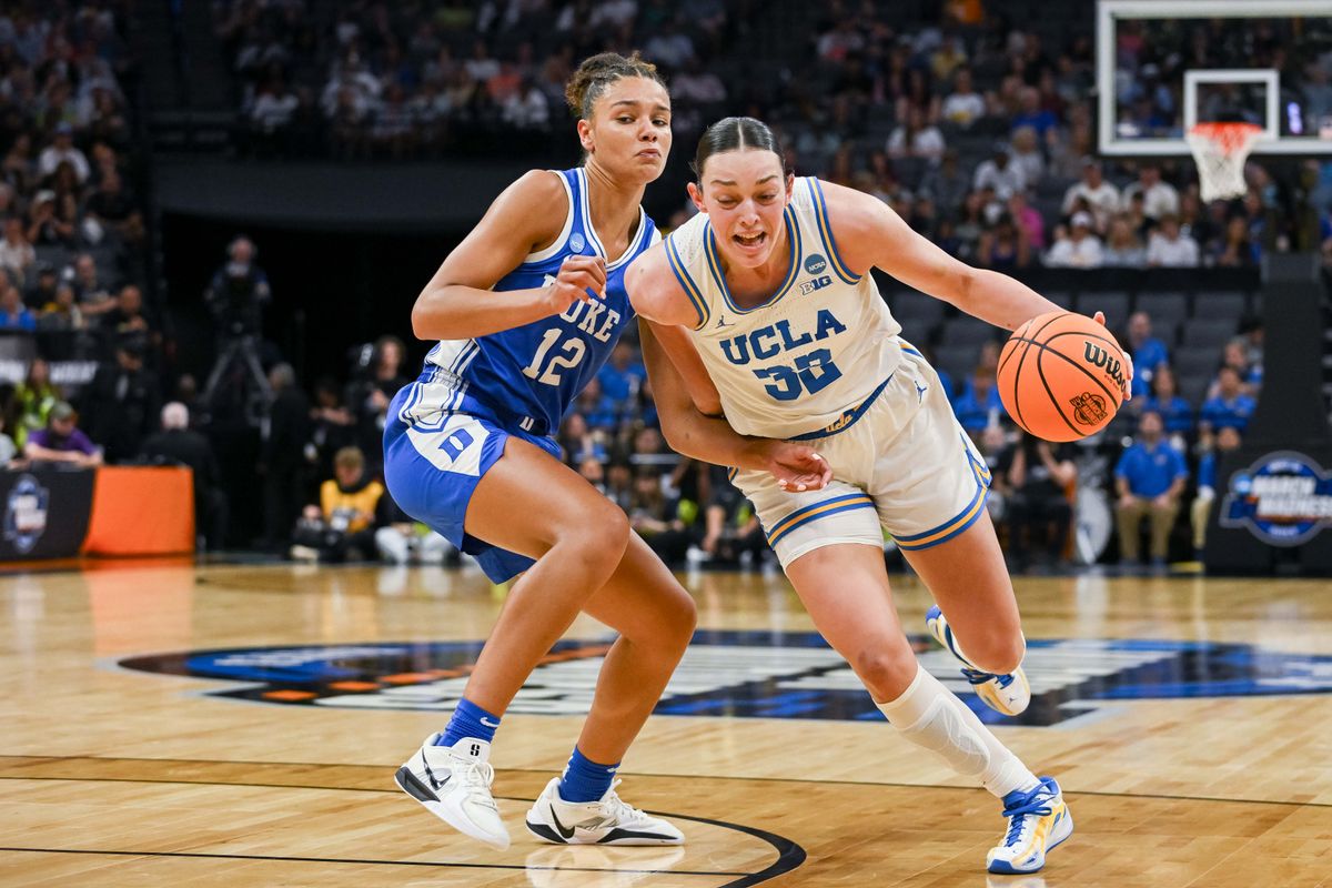 UCLA Bruins forward Angela Dugalić (32) drives to the basket against Duke Blue Devils forward Delaney Thomas (12) during the second quarter in the Sacramento Regional 4 of the women's 2026 NCAA Tournament at the Golden 1 Center. UCLA Bruins forward Angela Dugalić (32) drives to the basket against Duke Blue Devils forward Delaney Thomas (12) during the second quarter in the Sacramento Regional 4 of the women's 2026 NCAA Tournament at the Golden 1 Center.