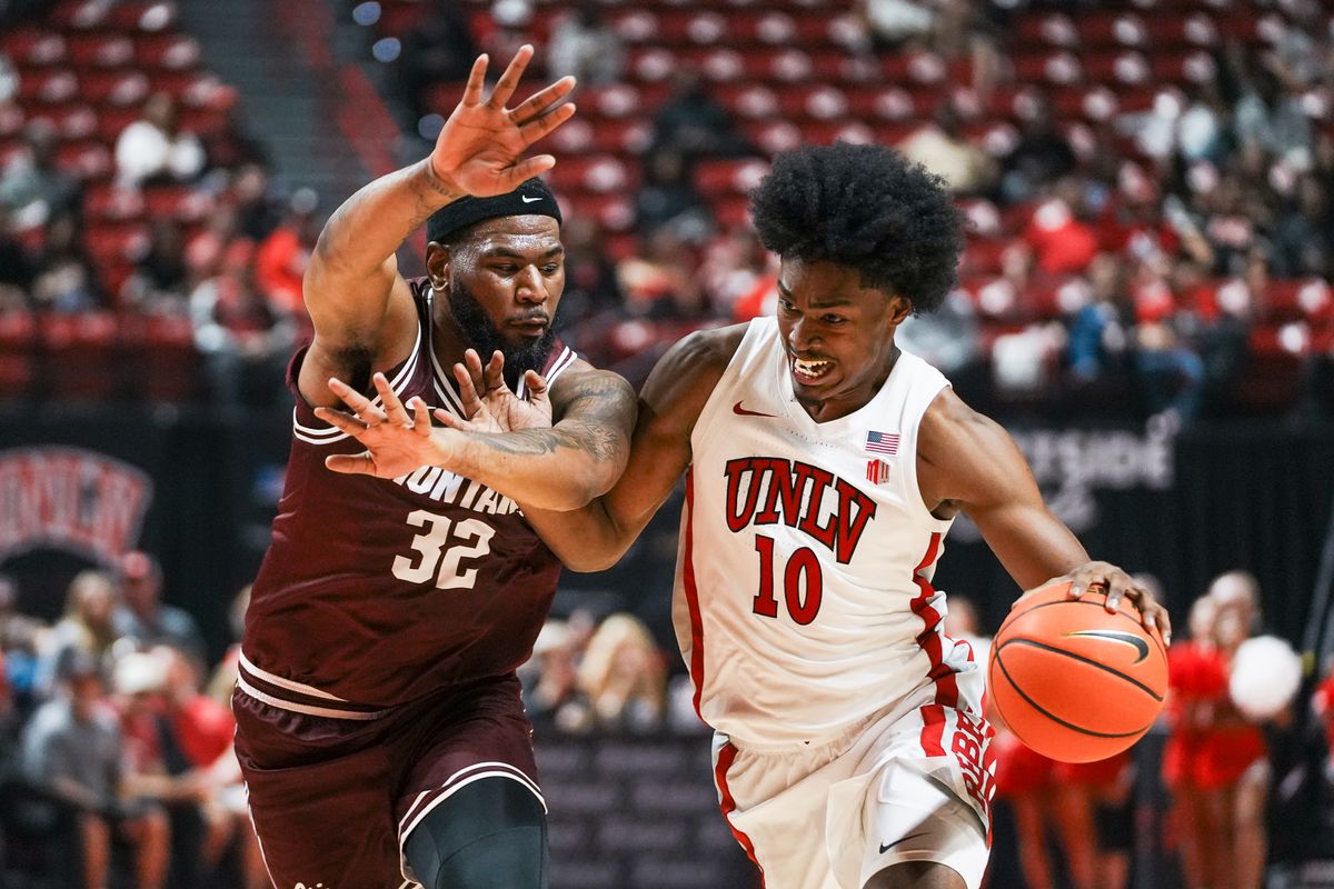 UNLV forward Jacob Bannarbie (10) drives towards the basket while guarded by Montana Te’Jon Sawyer (32) during first half of college basketball game against Montana on Tuesday, Nov. 11, 2025 at Thomas and Mack Center in Las Vegas. UNLV forward Jacob Bannarbie (10) drives towards the basket while guarded by Montana Te’Jon Sawyer (32) during first half of college basketball game against Montana on Tuesday, Nov. 11, 2025 at Thomas and Mack Center in Las Vegas.