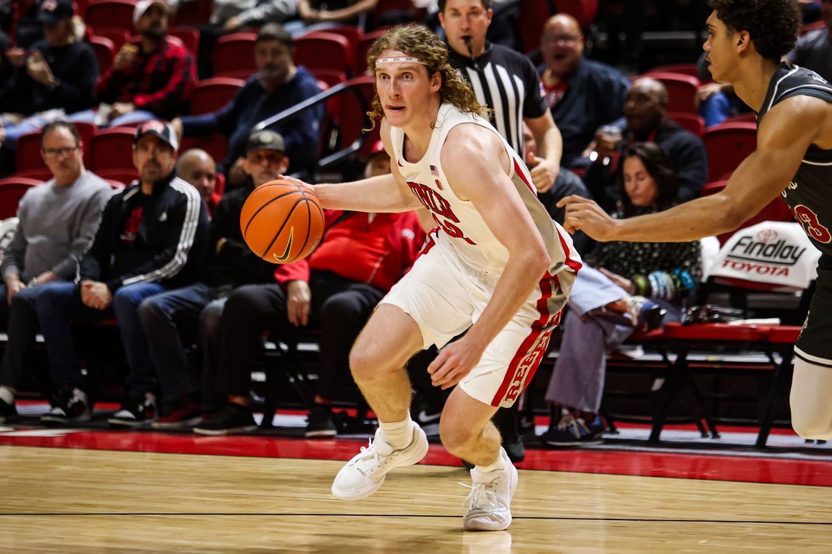 UNLV Runnin' Rebels F Walter Brown (22) drives up the court during an NCAA basketball game against the Saint Joseph's Hawks on Thursday November 20, 2025, in Las Vegas, Nevada. UNLV Runnin' Rebels F Walter Brown (22) drives up the court during an NCAA basketball game against the Saint Joseph's Hawks on Thursday November 20, 2025, in Las Vegas, Nevada.