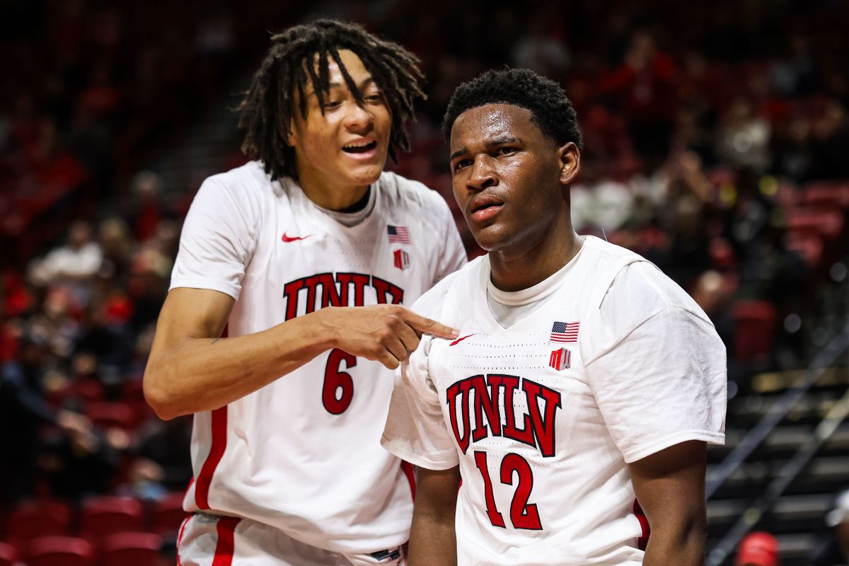 UNLV Runnin' Rebels F Tyrin Jones (6) and UNLV Runnin' Rebels G Isaac Williamson (12) react after Williamson scored against the Saint Joseph's Hawks on Thursday November 20, 2025, in Las Vegas, Nevada. UNLV Runnin' Rebels F Tyrin Jones (6) and UNLV Runnin' Rebels G Isaac Williamson (12) react after Williamson scored against the Saint Joseph's Hawks on Thursday November 20, 2025, in Las Vegas, Nevada.