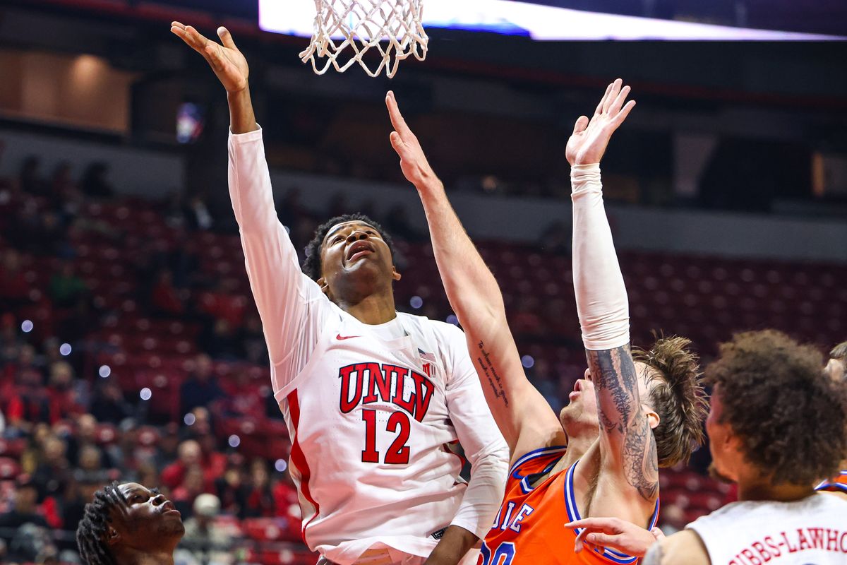 UNLV Runnin' Rebels G Issac Williamson (12) attempts a layup during a college basketball game against the Boise State Broncos on Tuesday January 13, 2026, in Las Vegas, Nevada. UNLV Runnin' Rebels G Issac Williamson (12) attempts a layup during a college basketball game against the Boise State Broncos on Tuesday January 13, 2026, in Las Vegas, Nevada.