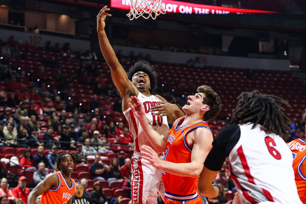 UNLV Runnin' Rebels F Jacob Bannarbie (10) lays up over a Boise State Broncos defender during a college basketball game on Tuesday January 13, 2026, in Las Vegas, Nevada. UNLV Runnin' Rebels F Jacob Bannarbie (10) lays up over a Boise State Broncos defender during a college basketball game on Tuesday January 13, 2026, in Las Vegas, Nevada.