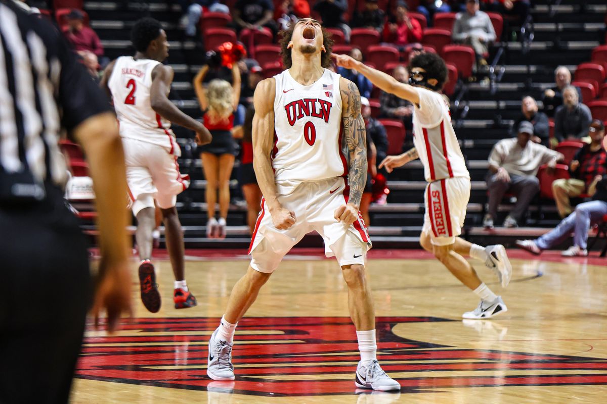 UNLV Runnin' Rebels G Dravyn Gibbs-Lawhorn (0) celebrates after scoring a three-point shot against the Boise State Broncos on Tuesday January 13, 2026, in Las Vegas, Nevada. UNLV Runnin' Rebels G Dravyn Gibbs-Lawhorn (0) celebrates after scoring a three-point shot against the Boise State Broncos on Tuesday January 13, 2026, in Las Vegas, Nevada.