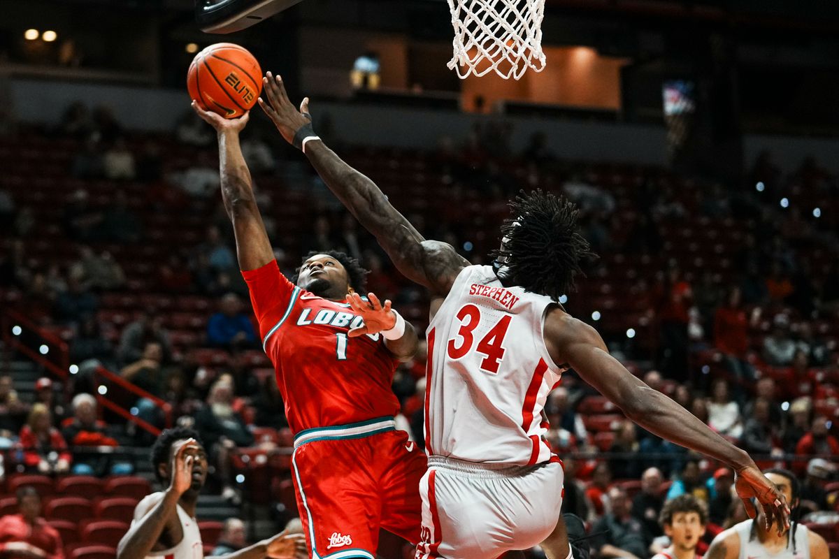 New Mexico guard Deyton Albury (1) shoots the ball while UNLV center Emmanuel Stephen (34) attempts to block the shot during second half of college basketball game against UNLV on Tuesday, January 27, 2026 at Thomas & Mack Arena in Las Vegas. New Mexico guard Deyton Albury (1) shoots the ball while UNLV center Emmanuel Stephen (34) attempts to block the shot during second half of college basketball game against UNLV on Tuesday, January 27, 2026 at Thomas & Mack Arena in Las Vegas.