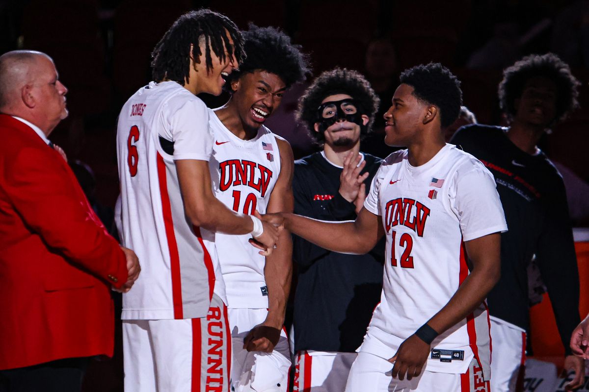 UNLV Runnin' Rebels G Issac Williamson (12) seen with his teammates F Tyrin Jones (6) and F Jacob Bannarbie (10) during pregame introductions against the San Jose State Spartans on Tuesday February 10, 2026, in Las Vegas, Nevada. UNLV Runnin' Rebels G Issac Williamson (12) seen with his teammates F Tyrin Jones (6) and F Jacob Bannarbie (10) during pregame introductions against the San Jose State Spartans on Tuesday February 10, 2026, in Las Vegas, Nevada.