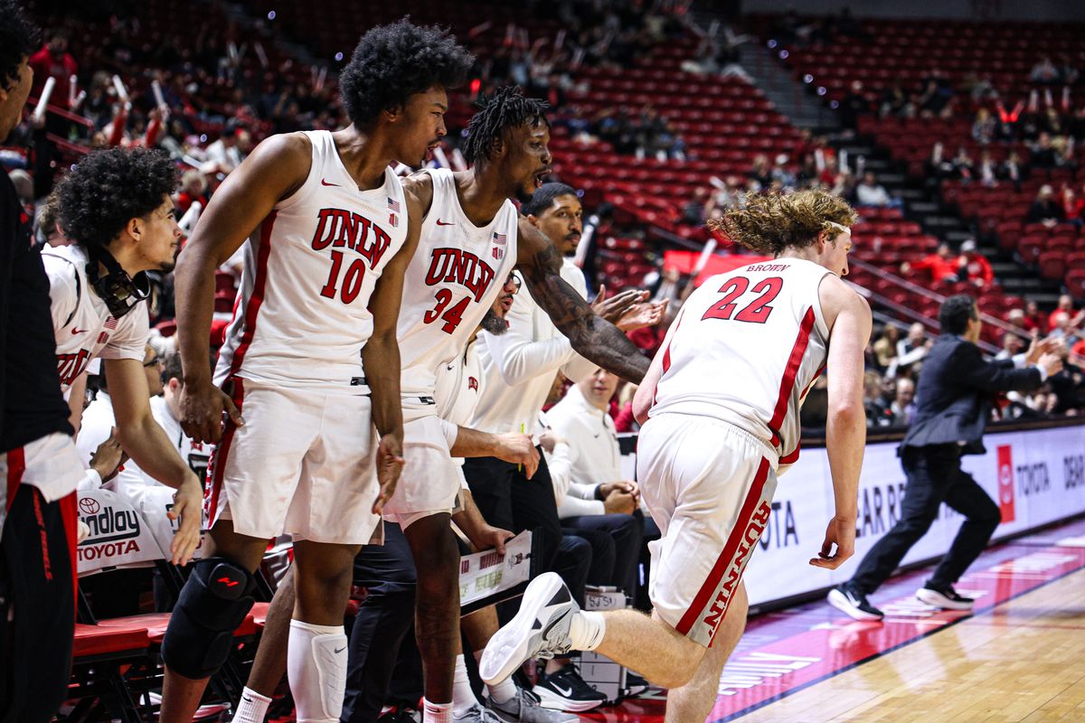 UNLV Runnin' Rebels F Jacob Bannarbie (10) and C Emmanuel Stephen (34) react after their teammate F Walter Brown (22) hits a three-point shot against the San Jose State Spartans on Tuesday February 10, 2026, in Las Vegas, Nevada. UNLV Runnin' Rebels F Jacob Bannarbie (10) and C Emmanuel Stephen (34) react after their teammate F Walter Brown (22) hits a three-point shot against the San Jose State Spartans on Tuesday February 10, 2026, in Las Vegas, Nevada.