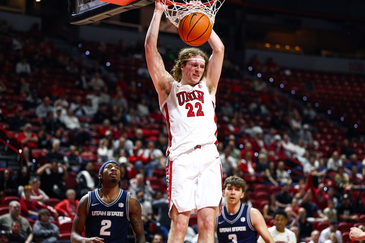 UNLV Runnin' Rebels senior F Walter Brown (22) dunks the ball during a college basketball game against the Utah State Aggies on Tuesday March 3, 2026, in Las Vegas, Nevada. UNLV Runnin' Rebels senior F Walter Brown (22) dunks the ball during a college basketball game against the Utah State Aggies on Tuesday March 3, 2026, in Las Vegas, Nevada.