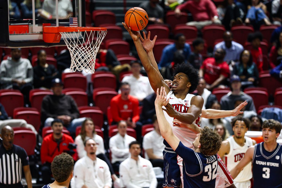 UNLV Runnin' Rebels F Jacob Bannarbie (10) draws a foul while shooting a lay-up shot during a college basketball game against the Utah State Aggies on Tuesday March 3, 2026, in Las Vegas, Nevada. UNLV Runnin' Rebels F Jacob Bannarbie (10) draws a foul while shooting a lay-up shot during a college basketball game against the Utah State Aggies on Tuesday March 3, 2026, in Las Vegas, Nevada.