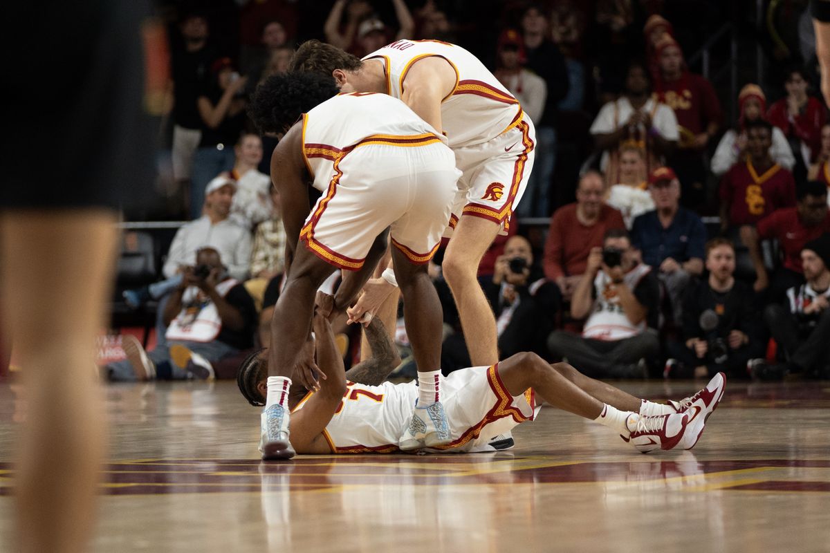 USC Trojans help up Guard Jordan Marsh (7) after he gets hit on a hard screen while defending during a men's college basketball game against the Maryland Terrapins, Tuesday January 13th, 2026 at Galen Center in Los Angeles, Calif. USC Trojans help up Guard Jordan Marsh (7) after he gets hit on a hard screen while defending during a men's college basketball game against the Maryland Terrapins, Tuesday January 13th, 2026 at Galen Center in Los Angeles, Calif.