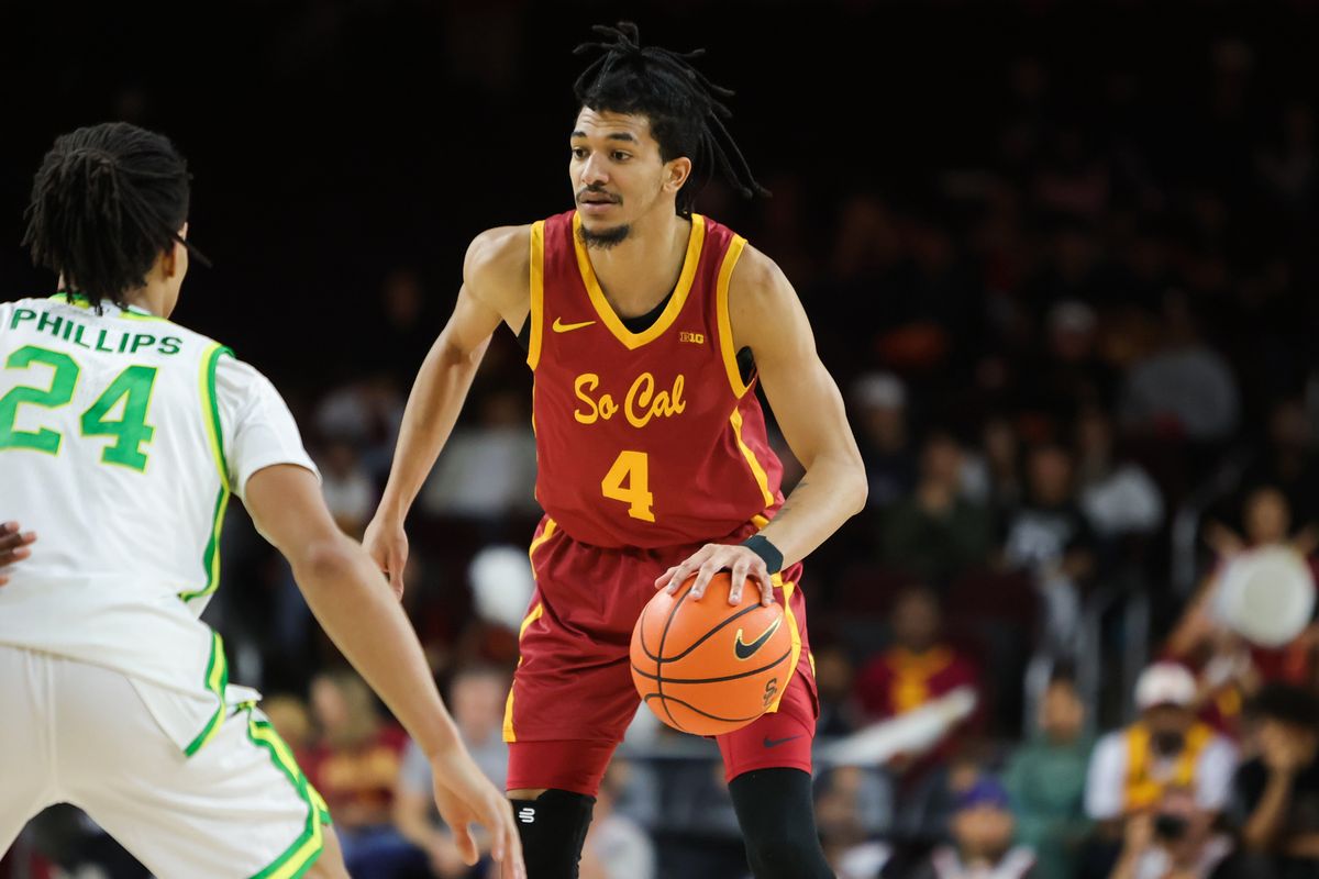 USC forward Chad Baker-Mazara (4) dribbles the basketball during an NCAA basketball game against Oregon on February 21, 2026 in Los Angeles, CA.