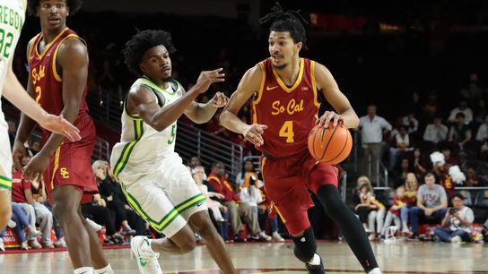 USC forward Chad Baker-Mazara (4) dribbles the basketball during an NCAA basketball game against Oregon on February 21, 2026 in Los Angeles, CA.