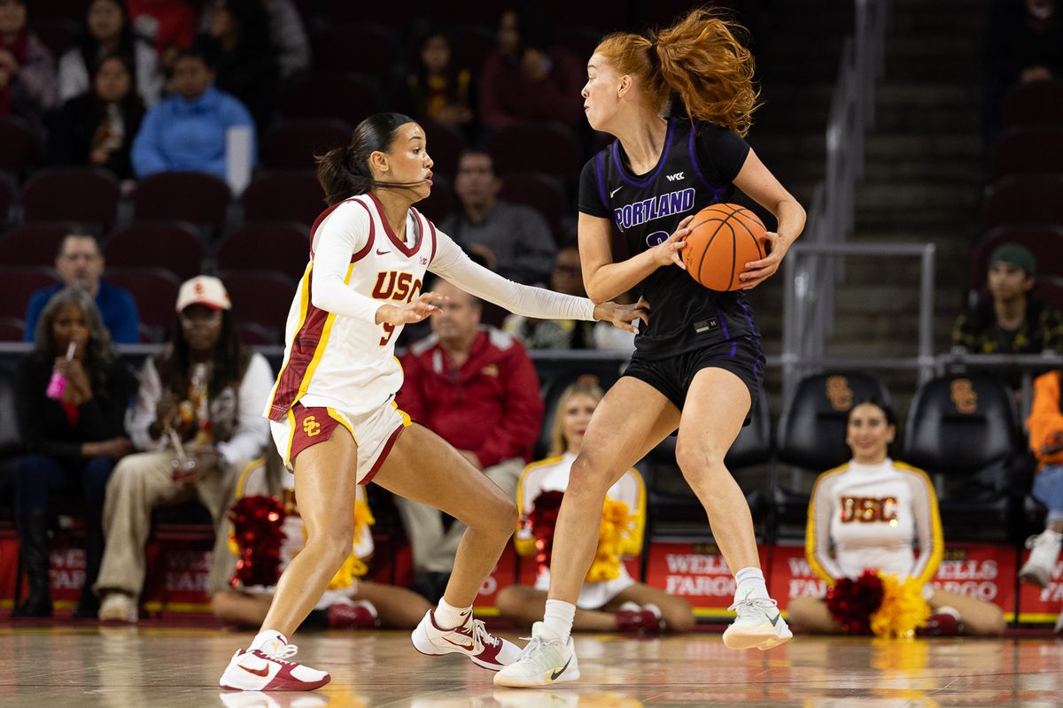 USC guard Jazzy Davidson (9) defends during a Big Ten college basketball game against the Portland Pilots, Tuesday November 18, 2025 in Los Angeles. USC guard Jazzy Davidson (9) defends during a Big Ten college basketball game against the Portland Pilots, Tuesday November 18, 2025 in Los Angeles.