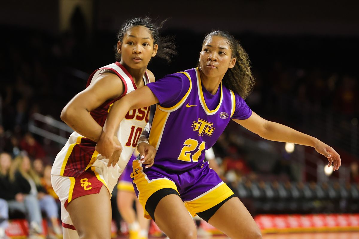 #10 G Malia Samuels of USC guards #21 G Chloe Larry of Tennessee Tech during an NCAA basketball game on November 25, 2025 in Los Angeles, CA. #10 G Malia Samuels of USC guards #21 G Chloe Larry of Tennessee Tech during an NCAA basketball game on November 25, 2025 in Los Angeles, CA.