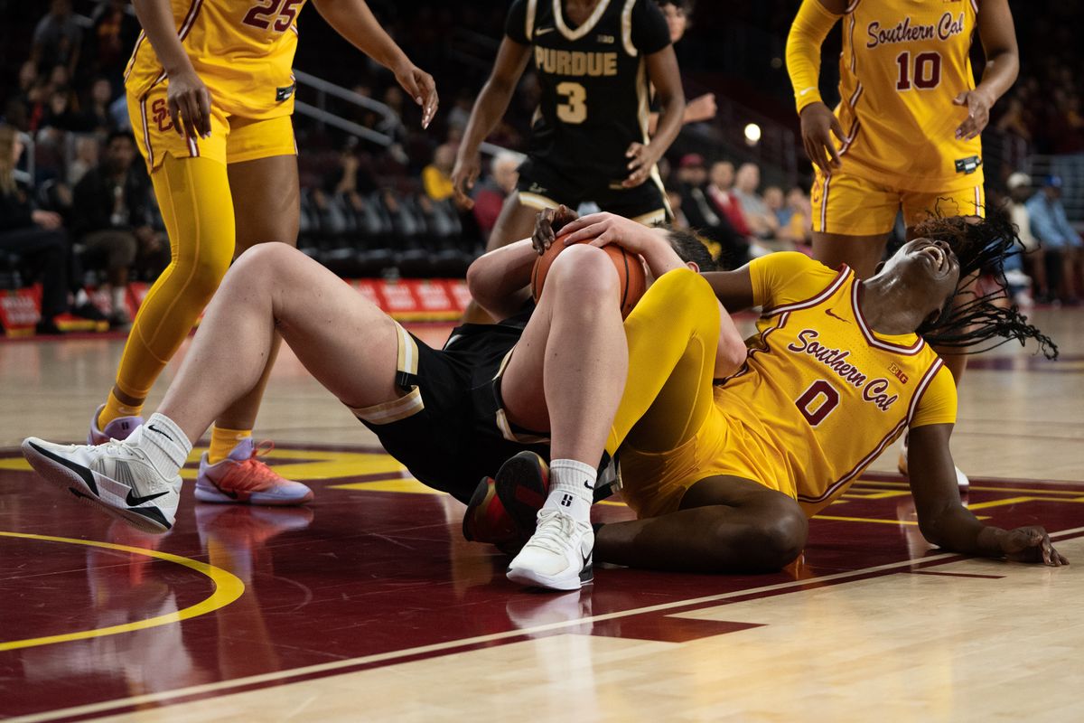 USC Trojans Forward Vivian Iwuchukwu (0) gets landed on during a scramble for the ball during a women's college basketball game against the Purdue Boilermakers, Sunday January 18th, 2026 at Galen Center in Los Angeles, Calif. USC Trojans Forward Vivian Iwuchukwu (0) gets landed on during a scramble for the ball during a women's college basketball game against the Purdue Boilermakers, Sunday January 18th, 2026 at Galen Center in Los Angeles, Calif.