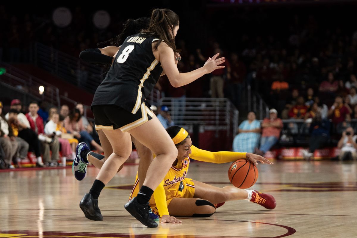USC Trojans Guard Kennedy Smith (11) gets knocked to the ground during a women's college basketball game against the Purdue Boilermakers, Sunday January 18th, 2026 at Galen Center in Los Angeles, Calif. USC Trojans Guard Kennedy Smith (11) gets knocked to the ground during a women's college basketball game against the Purdue Boilermakers, Sunday January 18th, 2026 at Galen Center in Los Angeles, Calif.