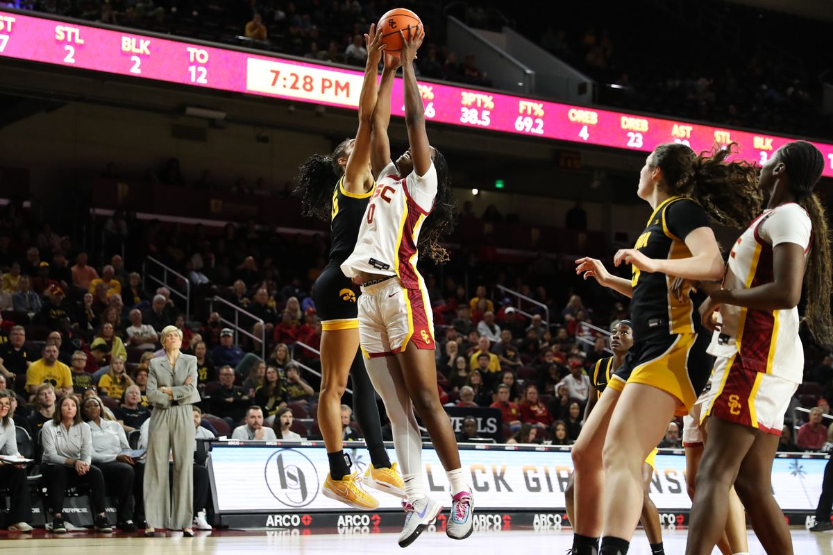 USC forward Vivian Iwuchukwu (0) battles for the loose rebound during an NCAA basketball game against the Iowa Hawkeyes on January 29, 2026 in Los Angeles, CA. USC forward Vivian Iwuchukwu (0) battles for the loose rebound during an NCAA basketball game against the Iowa Hawkeyes on January 29, 2026 in Los Angeles, CA.