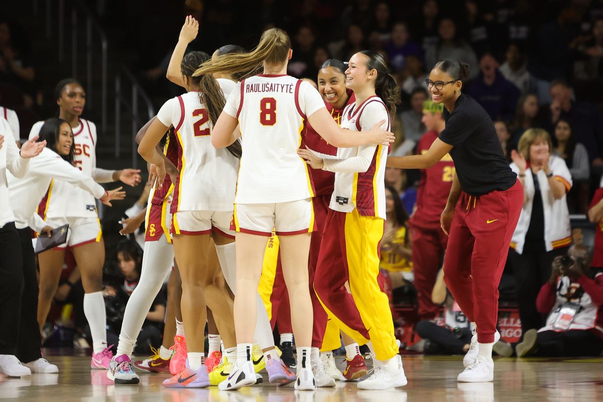 USC Trojan players celebrate a made basket while a timeout is called during an NCAA basketball game against the Iowa Hawkeyes on January 29, 2026 in Los Angeles, CA. USC Trojan players celebrate a made basket while a timeout is called during an NCAA basketball game against the Iowa Hawkeyes on January 29, 2026 in Los Angeles, CA.