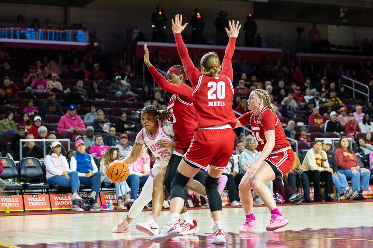 USC guard Kara Dunn (25) dribbles around defense during a Big Ten college basketball game against Wisconsin Badgers Thursday February 19, 2026  in Los Angeles.