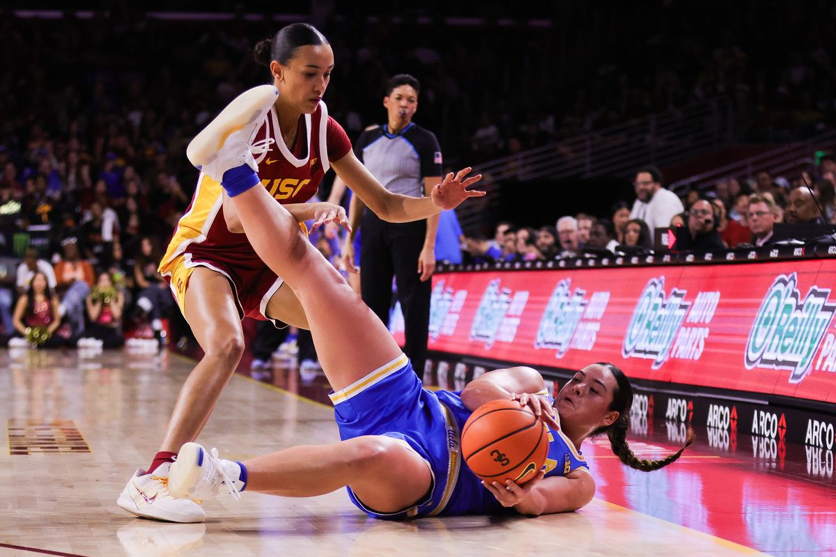 USC Trojans guard Charlisse Leger-Walker (5) falls with the ball during the women's college basketball game against the UCLA Bruins, Sunday March 1st, 2026 at Galen Center in Los Angeles, Calif. USC Trojans guard Charlisse Leger-Walker (5) falls with the ball during the women's college basketball game against the UCLA Bruins, Sunday March 1st, 2026 at Galen Center in Los Angeles, Calif.