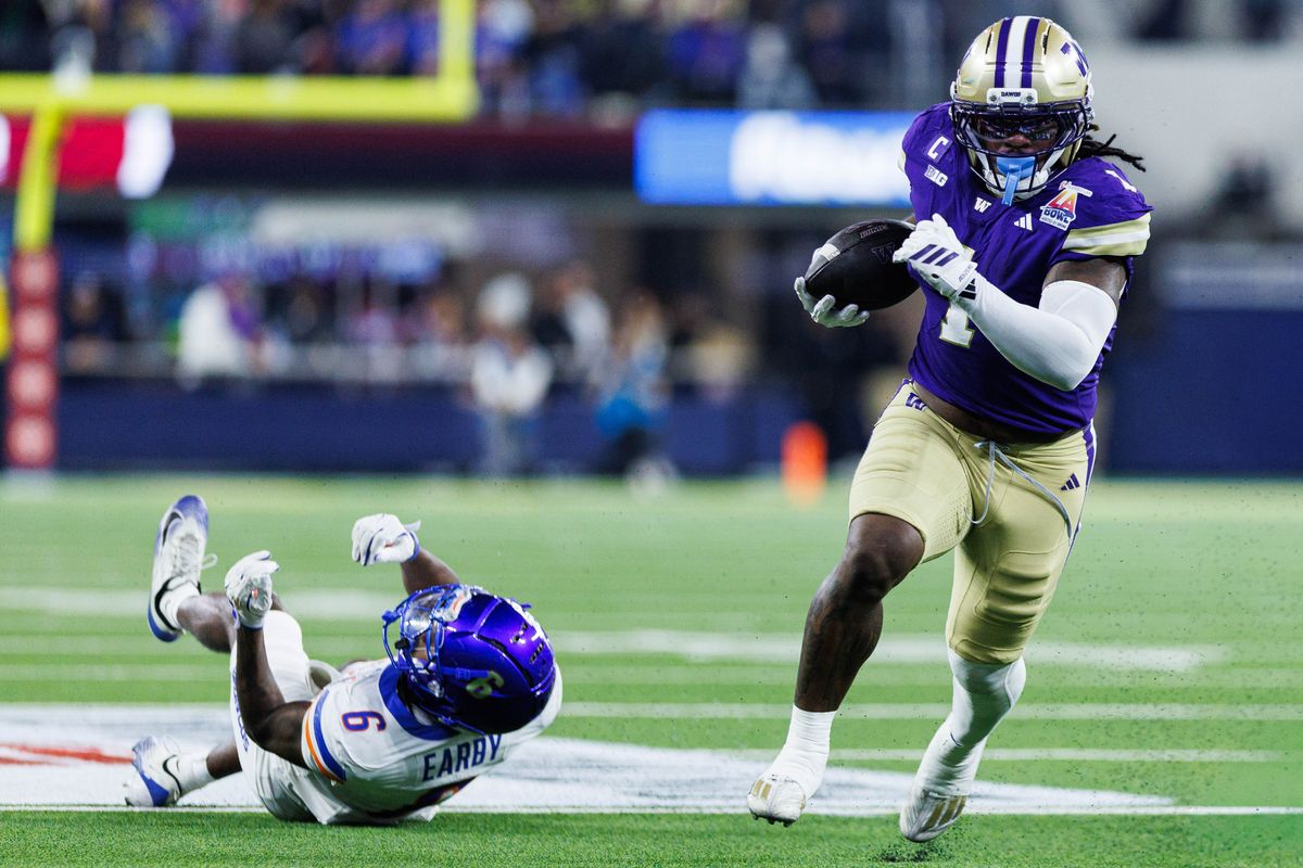 Washington Huskies running back Jonah Coleman (1) runs with the ball signals first down during the LA Bowl against the Boise State Broncos on December 13, 2025 in Los Angeles, California. Washington Huskies running back Jonah Coleman (1) runs with the ball signals first down during the LA Bowl against the Boise State Broncos on December 13, 2025 in Los Angeles, California.