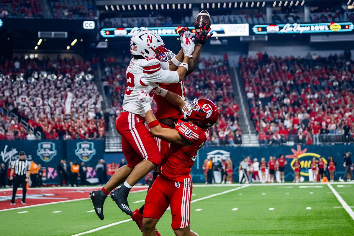 Nebraska Huskers running back Isiah Mozzee (22) jumps for a pass with Utah Utes defenders during the SRS Distribution Las Vegas Bowl game between the Nebraska Huskers and the Utah Utes, Sunday December 31, 2025 in Las Vegas, Nev. Nebraska Huskers running back Isiah Mozzee (22) jumps for a pass with Utah Utes defenders during the SRS Distribution Las Vegas Bowl game between the Nebraska Huskers and the Utah Utes, Sunday December 31, 2025 in Las Vegas, Nev.